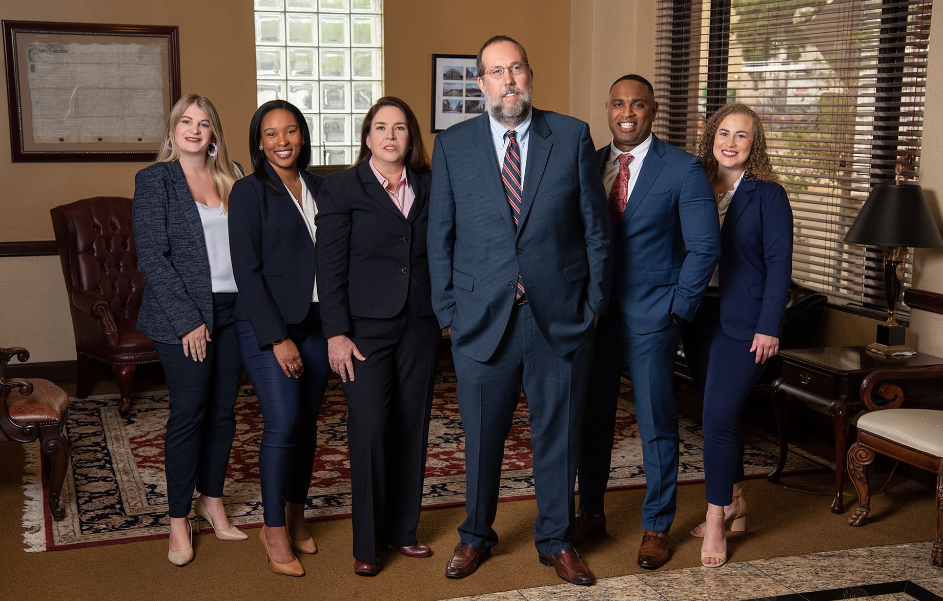 Attorneys from left to right: Katherine Aranda, Dominique Celerin, Leslie M. Sammis, Jason D. Sammis, Joshua Monteiro, Idalis Vento